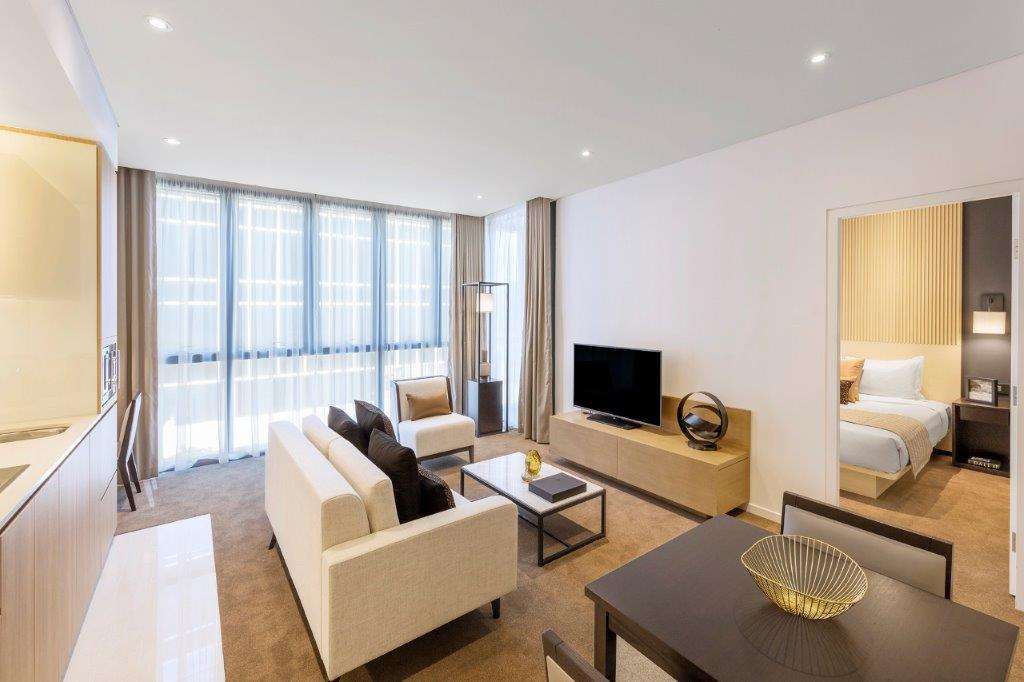 Skye Suites سيدني الغرفة الصورة A living room at the hotel
